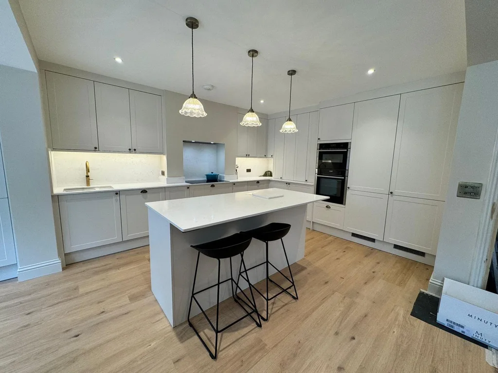 A white shaker kitchen with an island from Matthew 633's own work